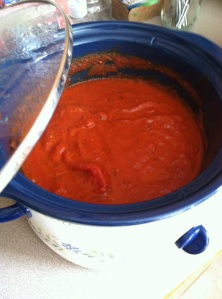 Marinara sauce cooking in the crockpot